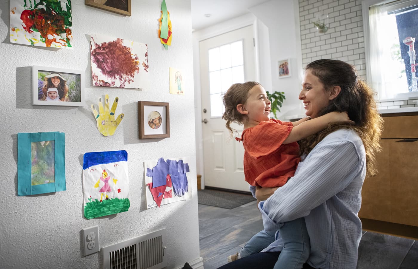 mother smiling with baby